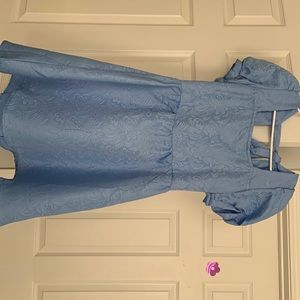 Short light blue dress.